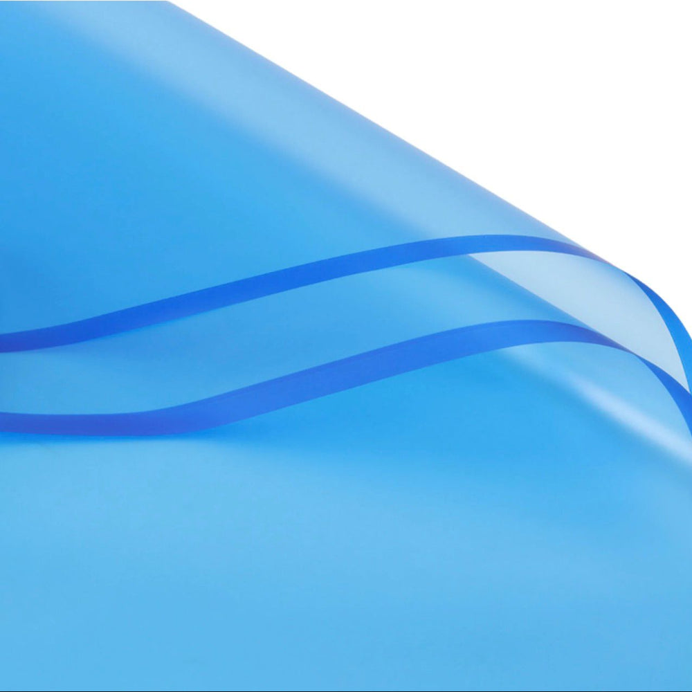 Blue plastic sheet with wavy pattern on a white background