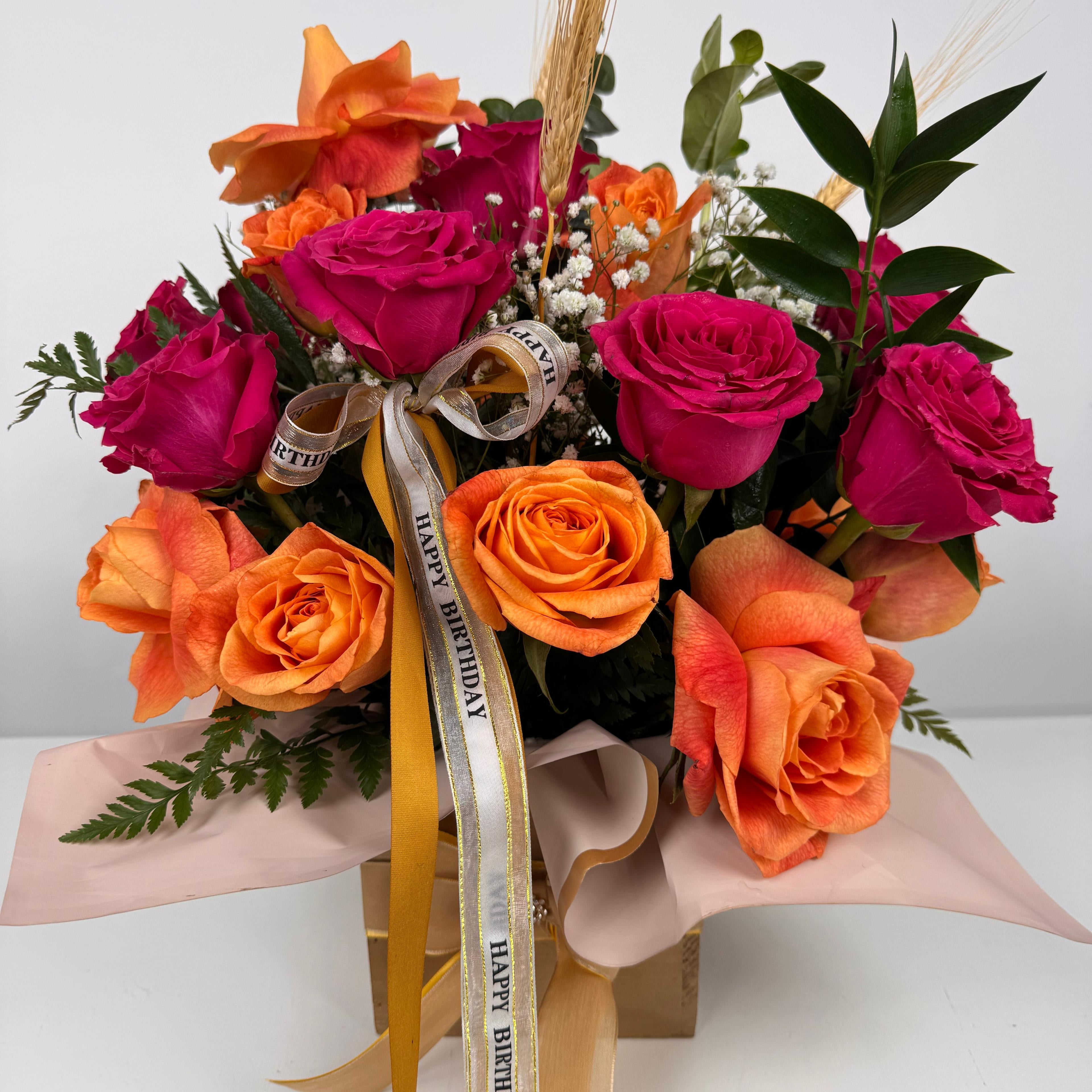 Mixed orange and pink roses