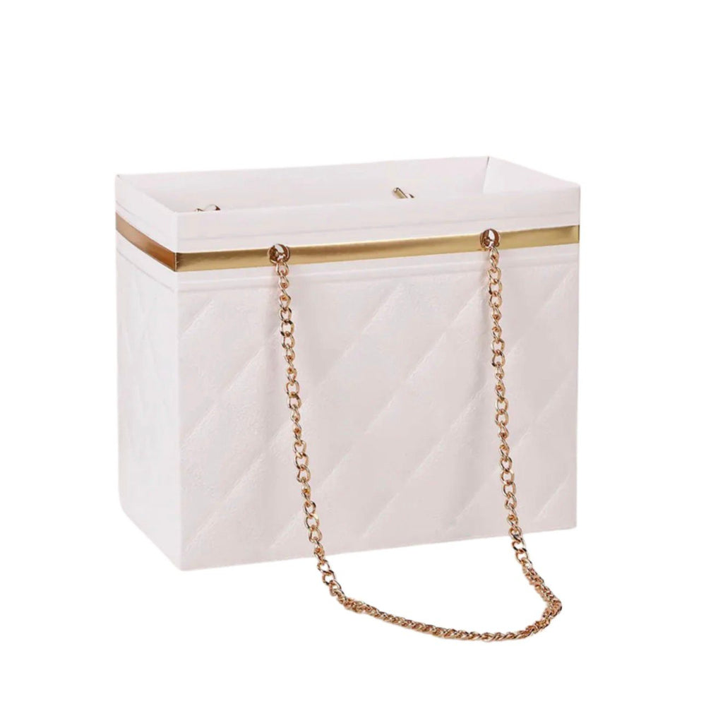 White clutch bag with gold chain strap on a white background